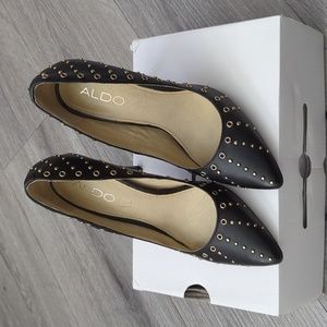 Also black leather and gold stud embellished heels